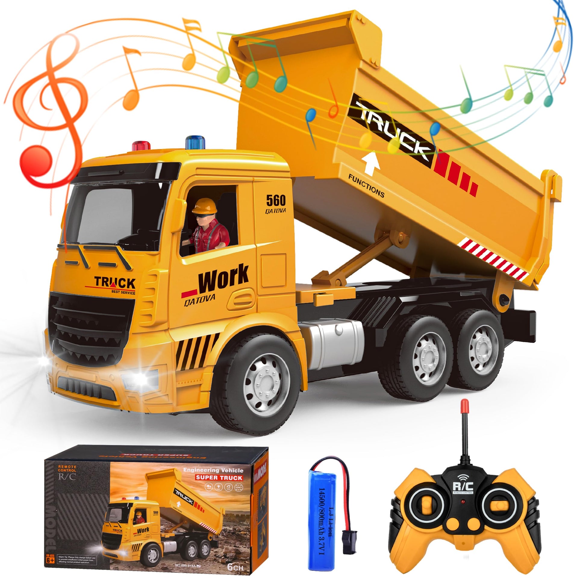 Toy dump truck with remote control, battery, and packaging on a white background