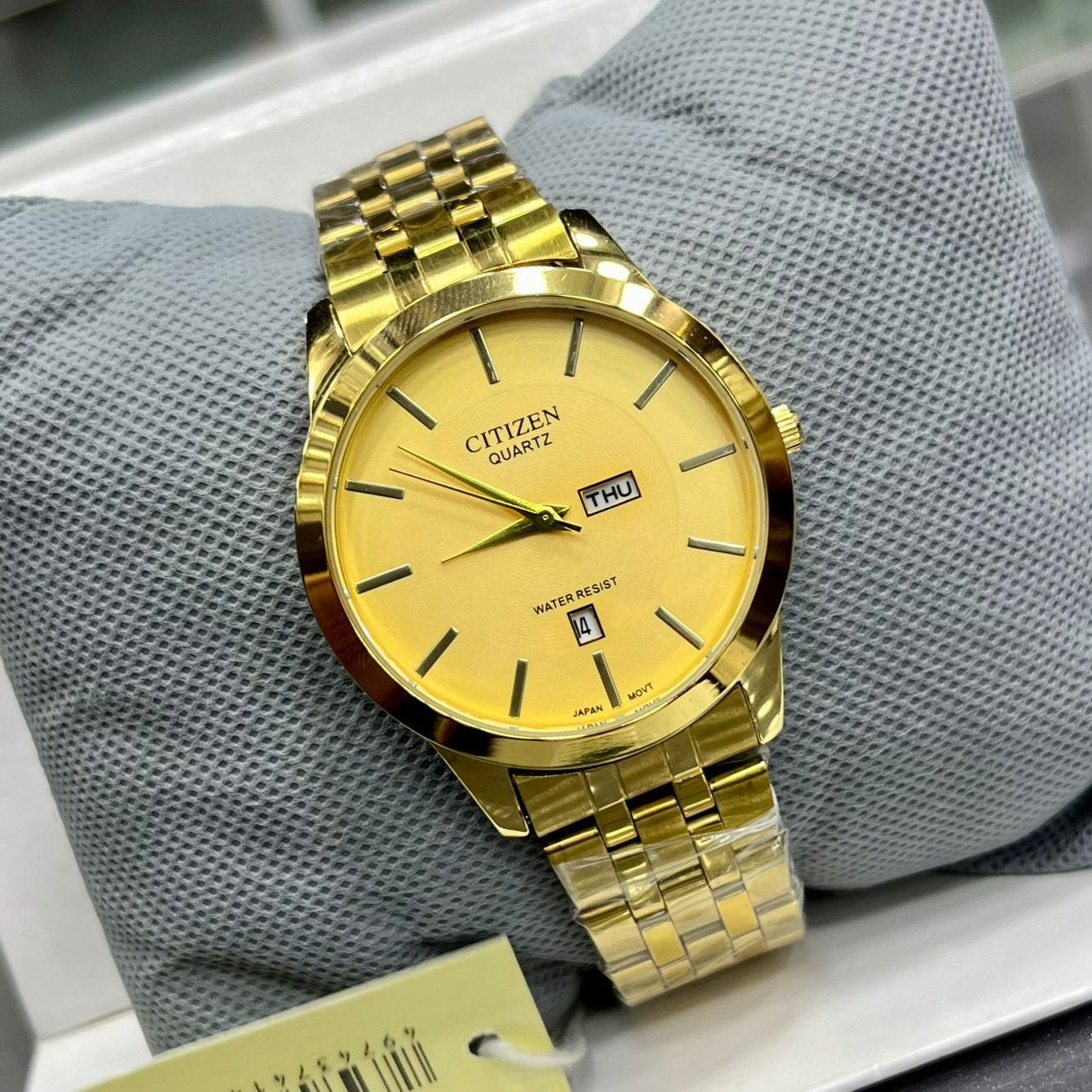 Citizen Wrist Watch
Material: Stainless Steel
Dial Diameter: 40 mm
Dial Colors: Gold 
Madina Gift