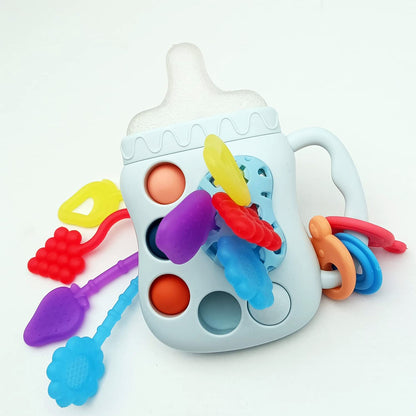 0257-1 Buy Cute Milk Bottle Shape Sensory Teething Toys For Toddlers - Madina Gift